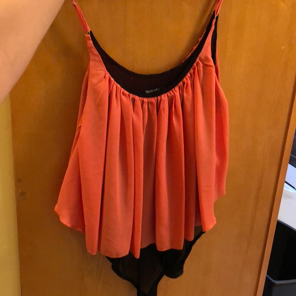 Orange flowy bodysuit top